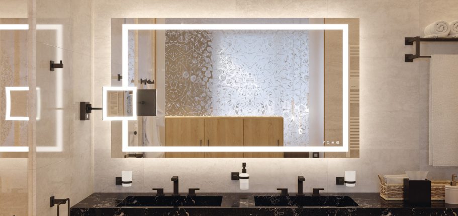 Baño moderno con espejo iluminado y grifos negros. Fondo con paredes claras y madera.